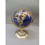 A terrestrial globe, the speckled blue body inlaid with hardstones with countries within double