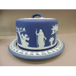 A Wedgwood blue jasper dip cheese dish and cover decorated in white relief with classical scenes