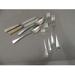 A quantity of George III, George IV table cutlery comprising two dessert spoons, two table forks,