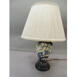 A Moorcroft table lamp, blue harebells, 16cm high excluding fittings