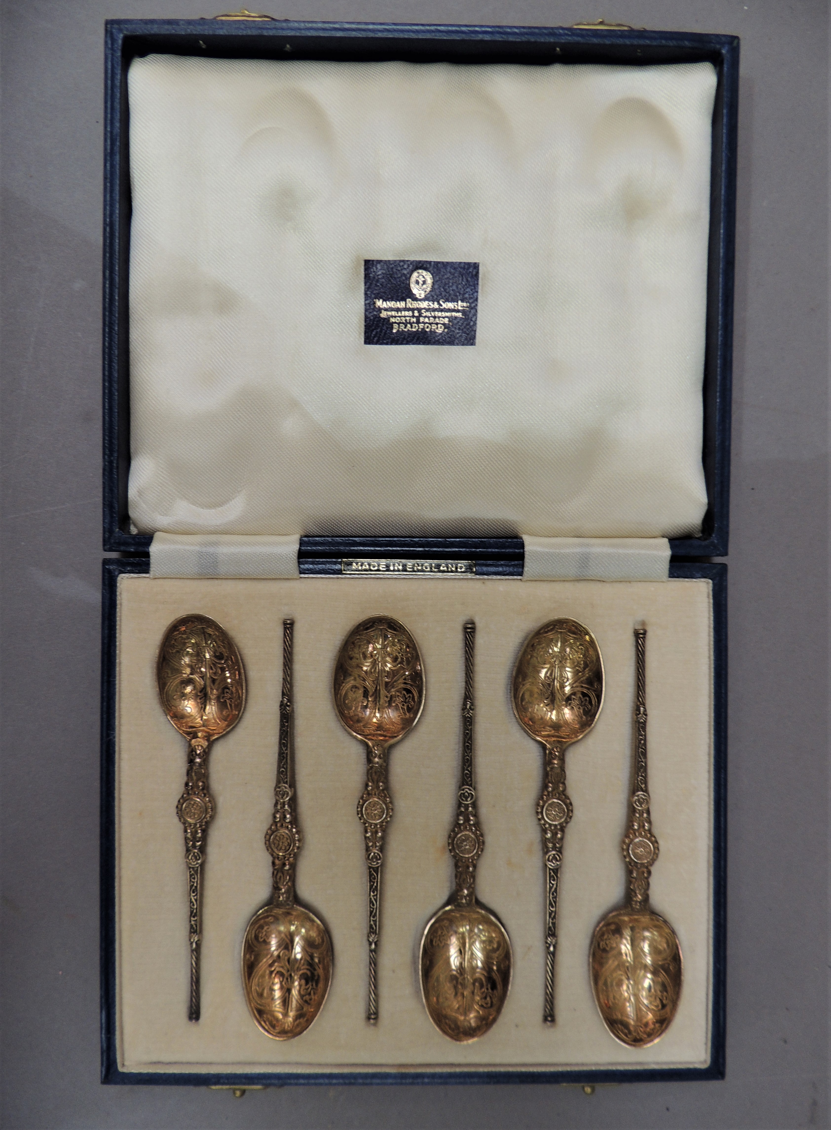 A cased set of silver gilt teaspoons in Elizabethan style with engraved bowls and cast tapered stems - Image 2 of 2