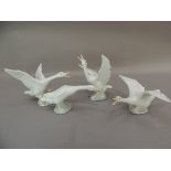 Four Lladro porcelain goose figures, various sizes