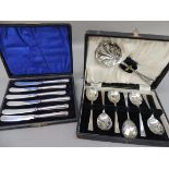 A set of six silver handled tea knives, together with a set of EPNS fruit spoons and server