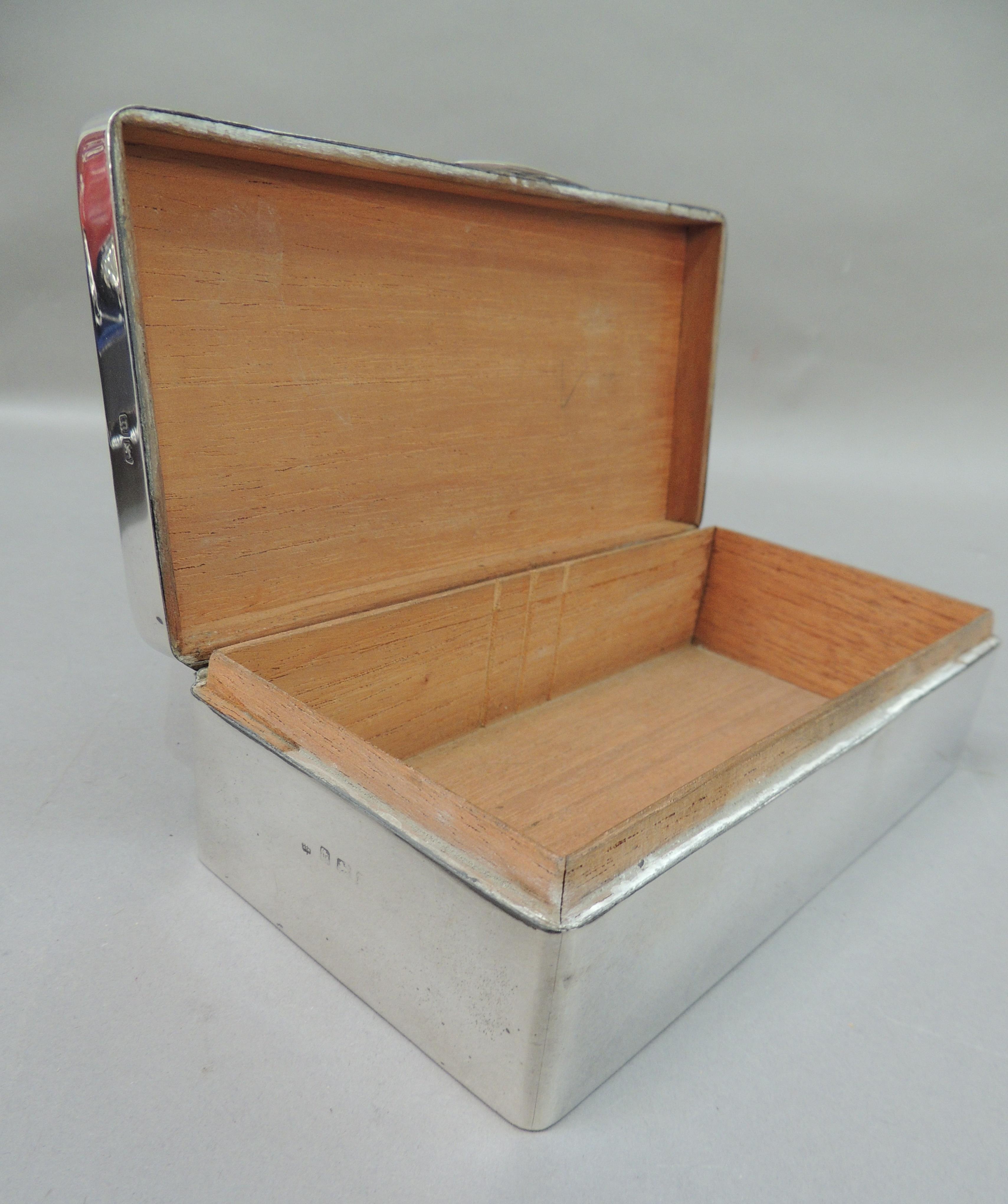 A rectangular silver cigarette box, slightly domed hinged lid, plain front, indistinct makers - Image 3 of 3