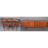 A Danish teak dining suite, c.1970s, comprising an extending dining table, rectangular, on rounded