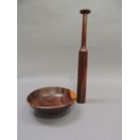 A coromandel wood turned bowl on foot rim, 21.5cm x 7cm high and a smokeline turned bottle shape
