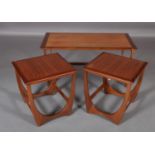 A G-Plan nest of three occasional tables, rectangular, on 'U' shaped refectory supports, 99cm wide x