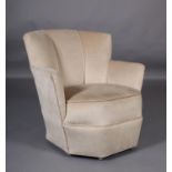 An Art Deco boudoir chair having a triple panel back and octagonal seat upholstered in oyster dralon