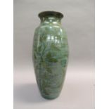 Lockhead, Kirkcudbright - a green glaze vase with leaf spray stencilling against an iridescent
