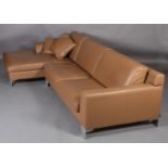 Arketipo, Italy, a camel leather 'L' shaped sofa with fold out head rests, on brushed steel
