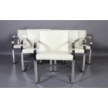 A set of six white leather and chrome framed cantilever chairs, upholstered to the back, seat and