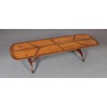A walnut and zebrawood coffee table, c.1960/70s, veneered in an organic design, on refectory
