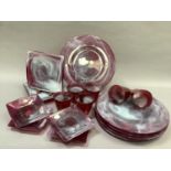 An Italian cranberry and white swirled glass dinner service comprising, six dinner plates 34cm
