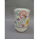 A Poole pottery vase, painted with trailing flowers on white ground, shape no. 695, printed mark