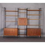 A range of Ladderax comprising four metal uprights, 200cm high; four teak shelves and a two door