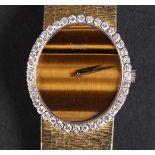 A PIAGET LADY'S DIAMOND AND TIGERS EYE SET MANUAL WRISTWATCH c.1974 in 18ct gold case no. 245591
