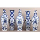 A SET OF FIVE CHINESE PORCELAIN GARNITURE VASES probably produced for the Dutch market, the three