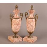 A PAIR OF LATE 19TH/EARLY 20TH CENTURY BRASS MOUNTED BRECHE VIOLETTE GARNITURE URNS, with waisted