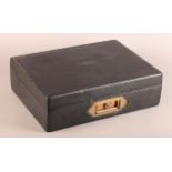 A 19TH CENTURY BLACK LEATHER WRITING BOX by Fisher, 183 Strand, initialled 'E.S.H', the interior