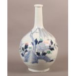 AN 18TH CENTURY CHINESE PORCELAIN BOTTLE VASE with tapered neck and bulbous body, decorated in
