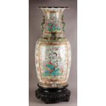A GOOD MID-19TH CENTURY FAMILLE ROSE LARGE ROULEAU VASE, the petal shaped rim finely enamelled