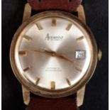 AN ACCURIST GENTLEMAN'S DATE AUTOMATIC WRISTWATCH c.1972 in 9ct gold case No 143, with ETA 2472 21