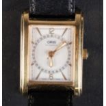 AN ORIS GENTLEMAN'S 7460 AUTOMATIC DATE WRISTWATCH in a rolled gold rectangular stepped case with