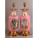 A PAIR OF SEVRES ROULEAU VASES, with rose pompadour grounds, each painted with panels of courting