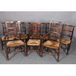 A MATCHED SET OF EIGHT 18TH CENTURY LANCASHIRE SPINDLE BACK CHAIRS with shaped top rails, the single