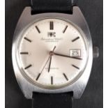 AN IWC GENTLEMAN'S AUTOMATIC DATE WRISTWATCH c.1970 in brushed stainless steel tonneau case,