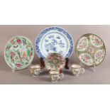 A CHINESE FAMILLE VERTE CIRCULAR DISH enamelled with bird, butterflies and flower filled basket