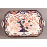 A ROYAL CROWN DERBY TWO HANDLED CABINET TRAY, canted rectangular, pattern 783, 48.5cm wide over