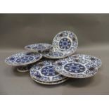 A Coalport blue and white dessert service comprising comport and two tazza and six plates