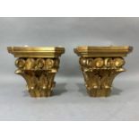 A pair of giltwood wall brackets of leaf and scroll capitol design, height 18.5cm