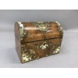 A Victorian figured walnut dome-topped stationery box with cut gilded brass and ivory work, interior