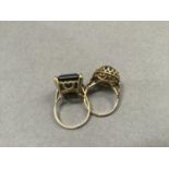 Two smoky quartz set dress rings, both in 9ct gold, total approximate weight 14g