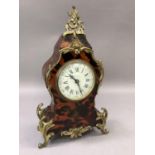 A French faux tortoise shell and gilt metal mantel clock retailed by Mappin and Webb, the drum