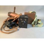 A six-20 Junior Brownie camera, cased, No H648941/A.M.; together with a pair of vintage field