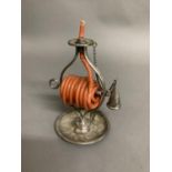 An early 19th century plated on copper wax jack