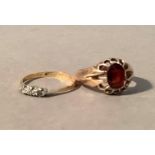 A George V gentleman's style stone garnet ring in 9 carat rose gold, the oval faceted stone claw set