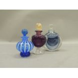 Three glass scent bottles by David Wallis including a blue and clear glass cased scent bottle of