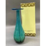 An art studio turquoise glass vase having a disc rim and lobed and bulb shaped body, with lustre