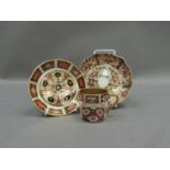 A Royal Crown Derby pin tray, 11cm diameter a circular printed bonbon dish, 13cm diameter and a