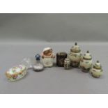 Miniature ornaments including a Beswick Beatrix Potter Mrs Tiggywinkle, an oval trinket box, a set