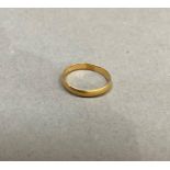 A George V wedding ring in 22ct gold, hallmarked Birmingham 1928, approximate weight 2g