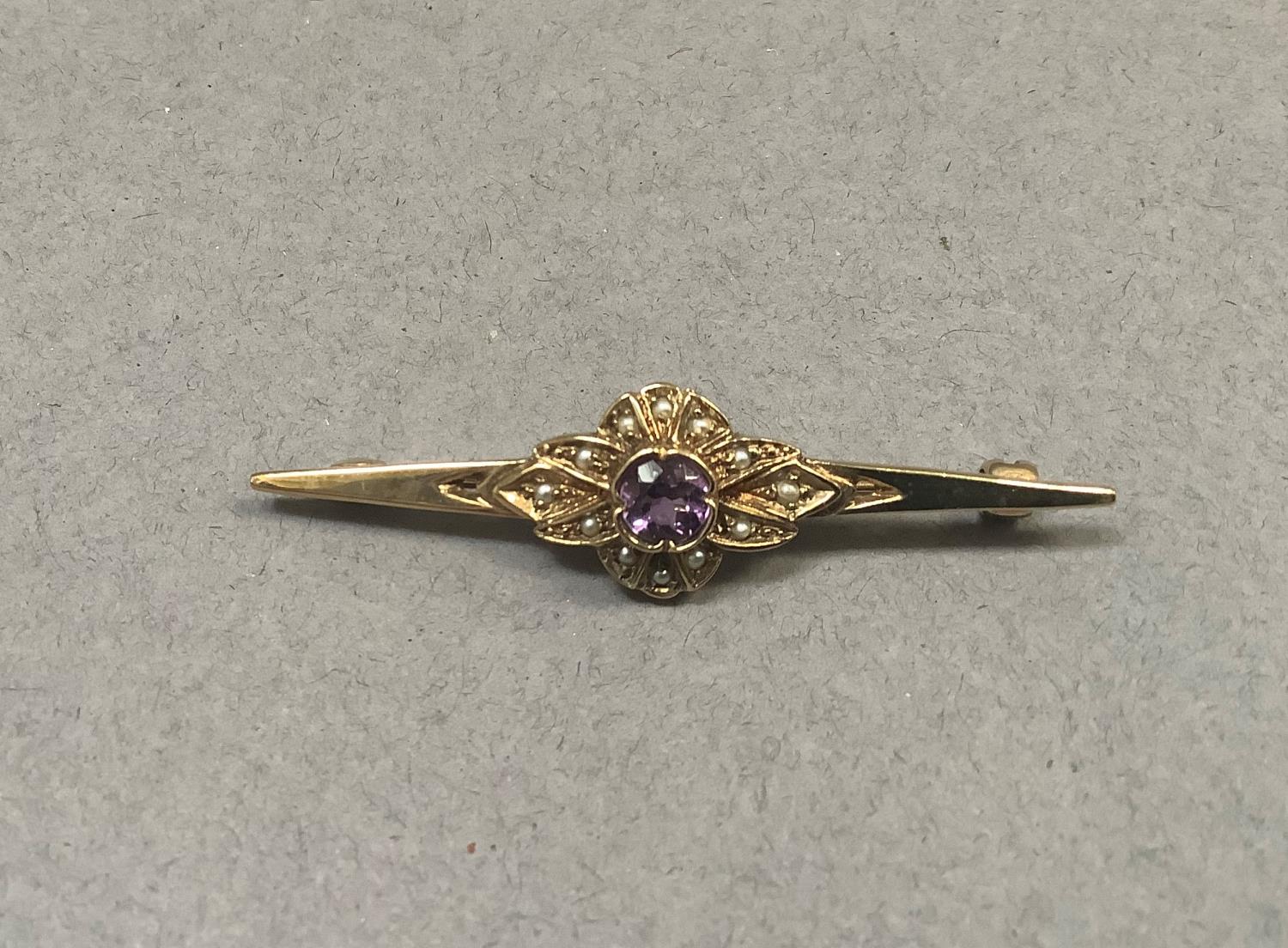An amethyst and seed pearl cluster brooch in 9ct gold, approximate length 50mm, approximate weight - Image 2 of 2