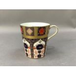 A Royal Crown Derby coffee mug, pattern number 1128.