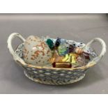 A collection of seventeen Murano glass 'sweets' held in a blue and white china two handled basket of