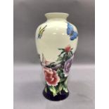 An old Tupton ware baluster vase tube lined and polychrome enamelled with butterflies among peonies,