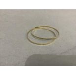 Two bangles in 9ct gold each with engine cut pattern, total approximate weight 6g